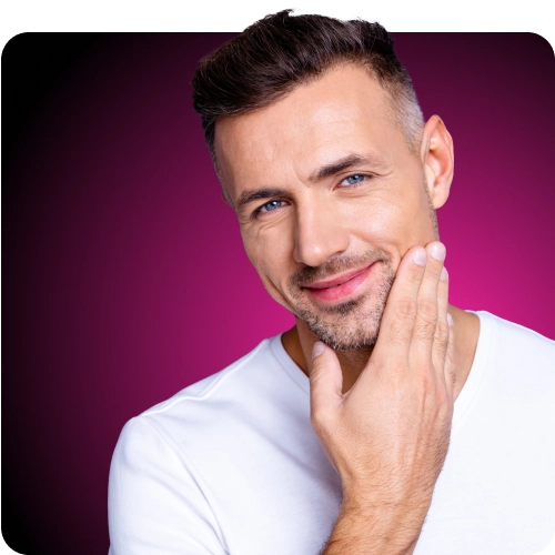 Man in a white tshirt smiling with great hair